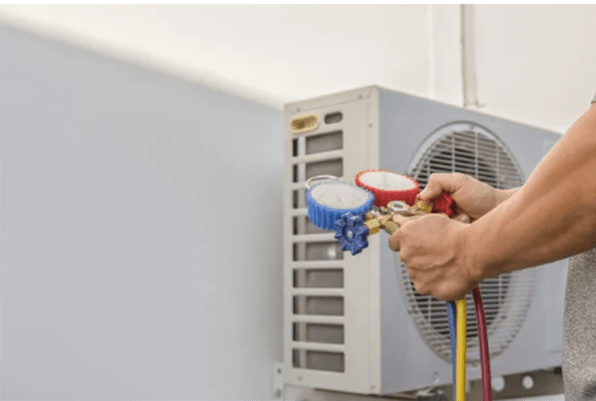 a technician is trying to add refrigerant to an AC compressor